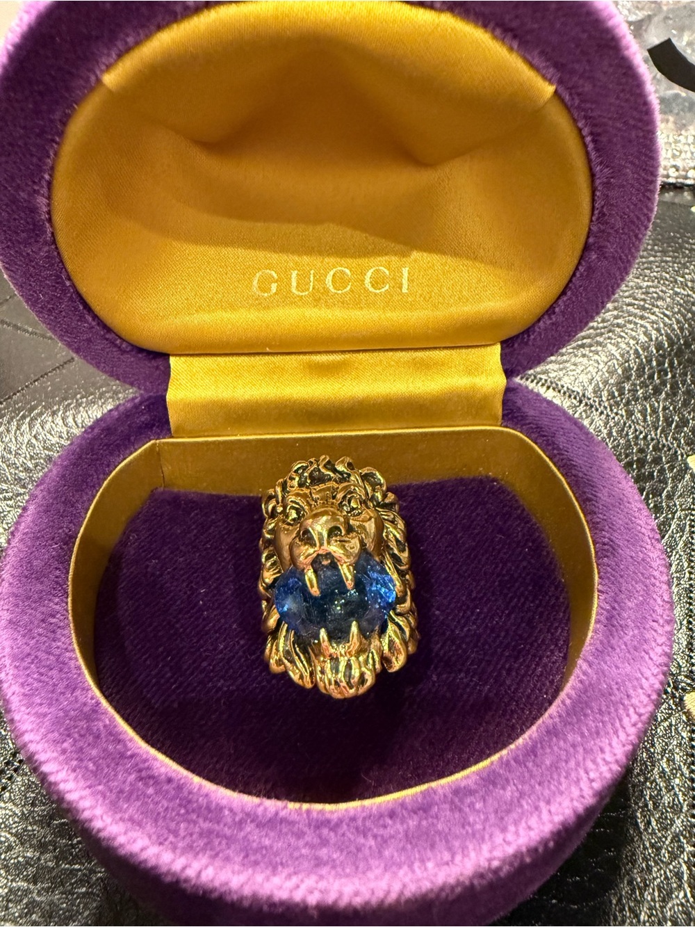 Gucci Gold Lion Head Ring with Blue Crystal Accent